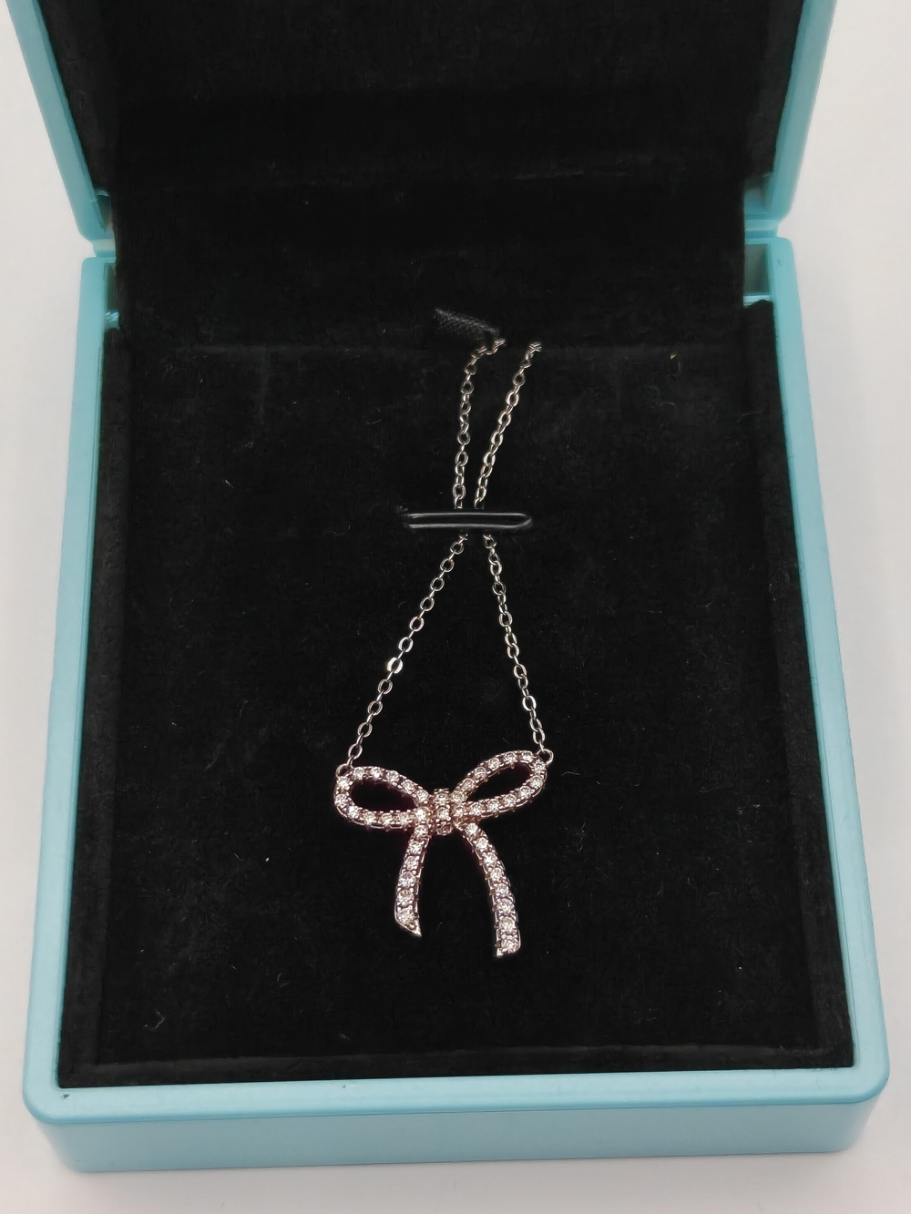 Sterling Silver Moissanite Bow Shape Necklace - Picture 5 of 6